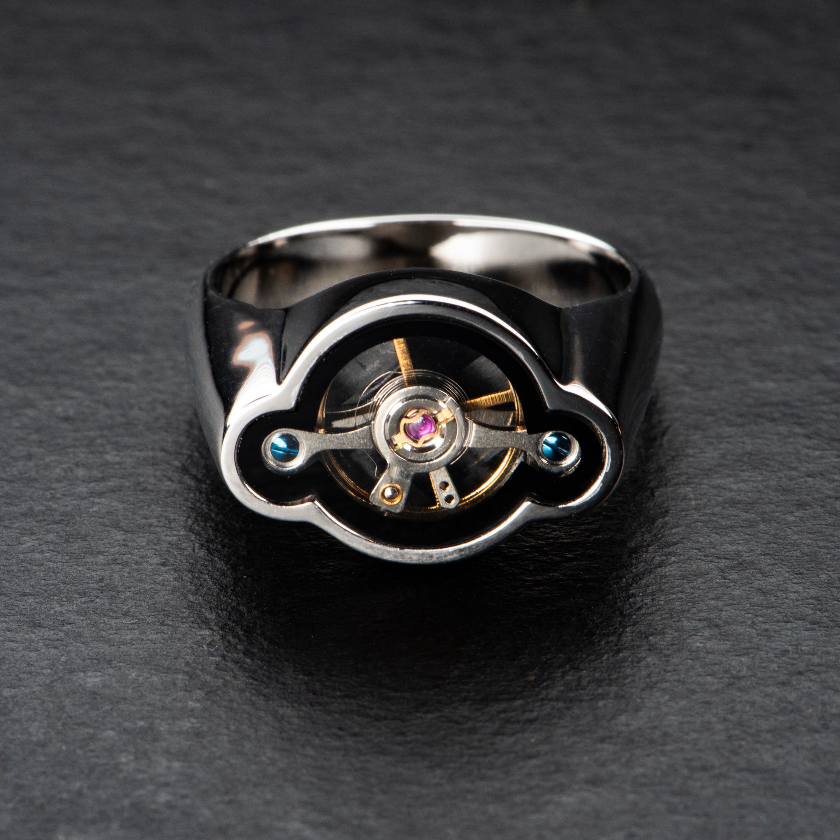 Regulator ring with rotating kinetic balance wheel