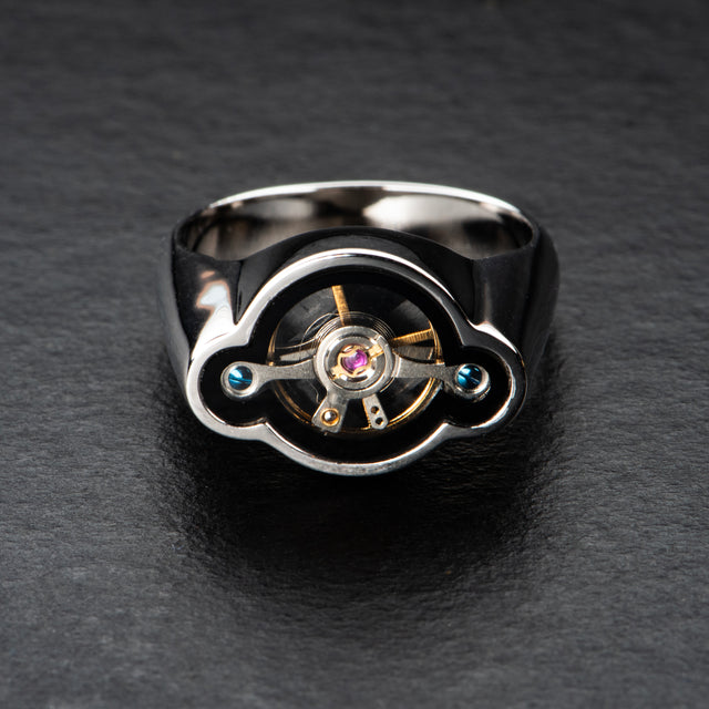 Regulator ring with rotating kinetic balance wheel